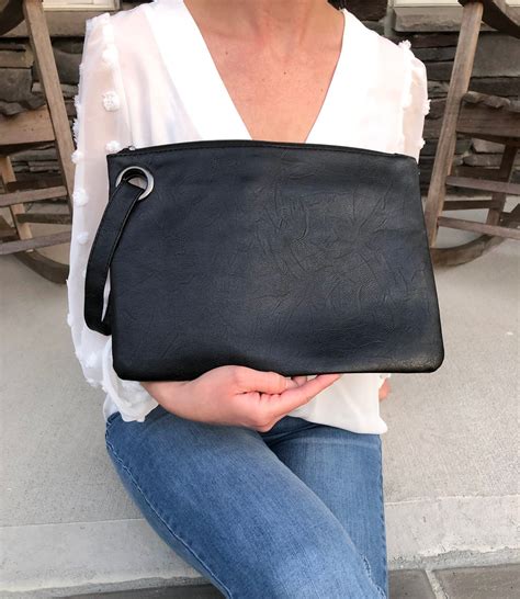 oversized wristlet clutch.